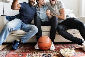 Guys Watching Sports on Couch