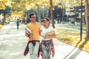 College Couple Walking Together