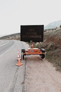 Social distancing road sign